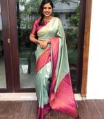 Mint green silk blend saree with vibrant magenta border