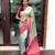 Mint green silk blend saree with vibrant magenta border