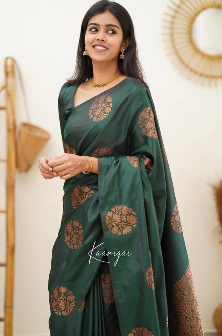 Deep teal silk blend saree with copper motifs
