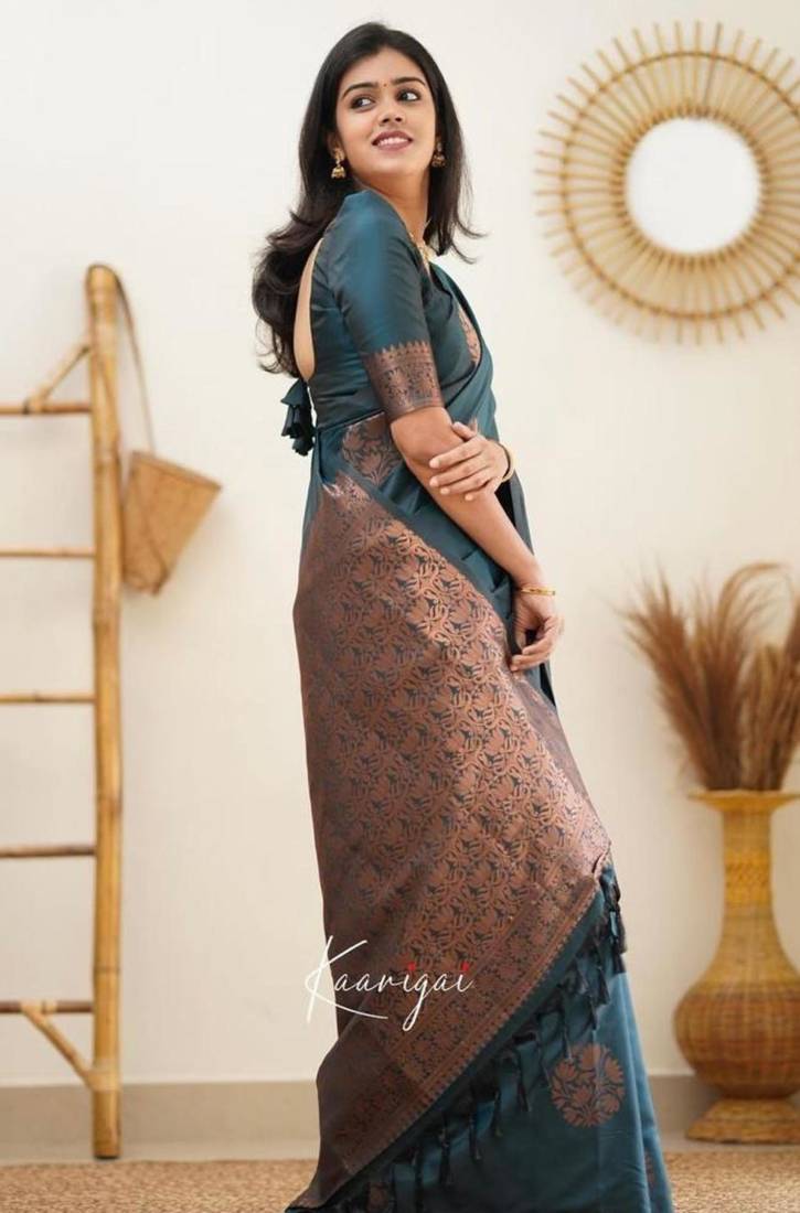 Deep teal silk blend saree with copper motifs