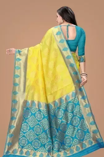 Radiant yellow silk blend saree with ornate teal border