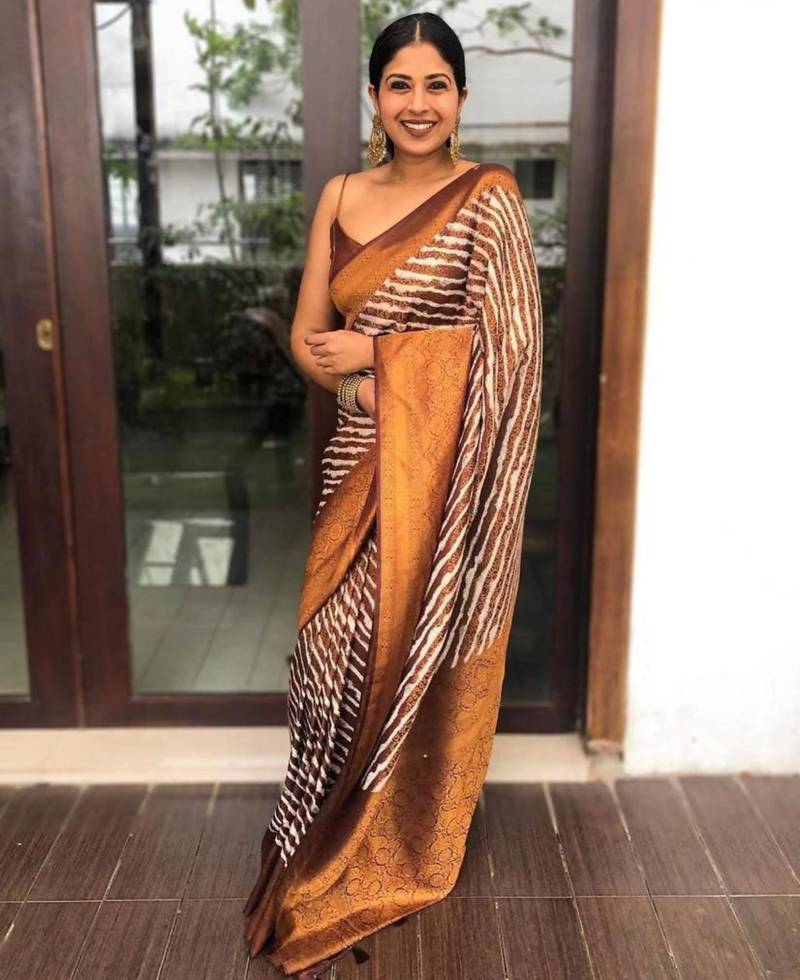 Abstract brown and white striped silk blend saree