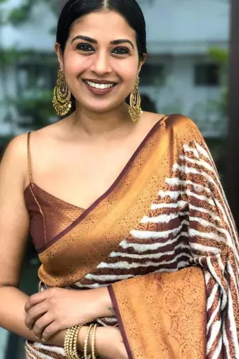 Abstract brown and white striped silk blend saree
