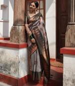 Sophisticated taupe silk blend saree with geometric border
