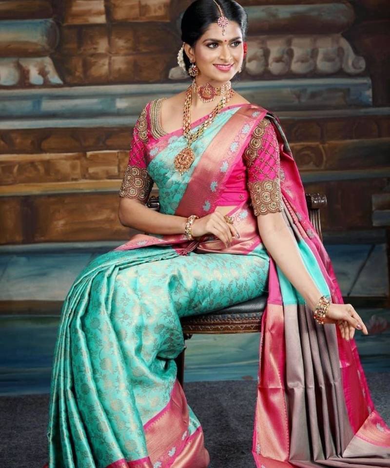 Blue and pink silk blend saree with zari border