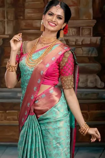Blue and pink silk blend saree with zari border