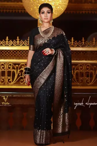 Elegant black silk blend saree with copper brocade work