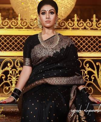 Elegant black silk blend saree with copper brocade work 4