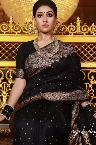 Elegant black silk blend saree with copper brocade work