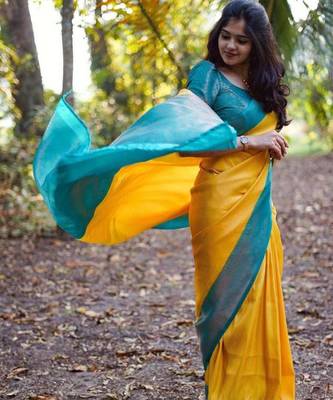 Vibrant mustard yellow and teal silk blend saree 1