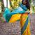 Vibrant mustard yellow and teal silk blend saree