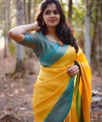 Vibrant mustard yellow and teal silk blend saree 4