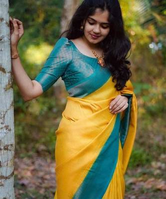 Vibrant mustard yellow and teal silk blend saree 5