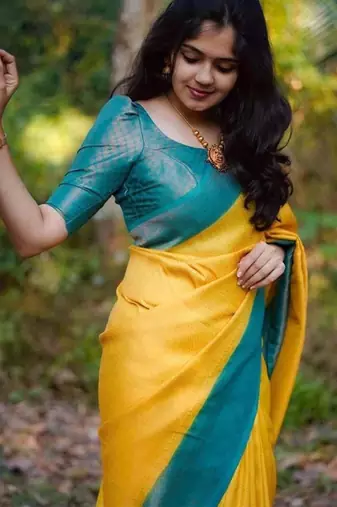 Vibrant mustard yellow and teal silk blend saree