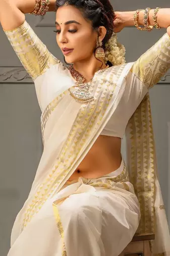 Classic off-white silk blend saree with golden zari border