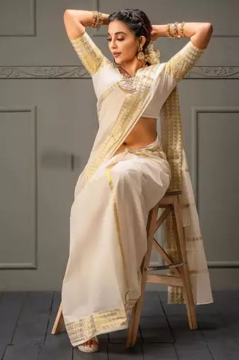 Classic off-white silk blend saree with golden zari border