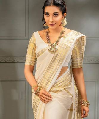 Classic off-white silk blend saree with golden zari border 5