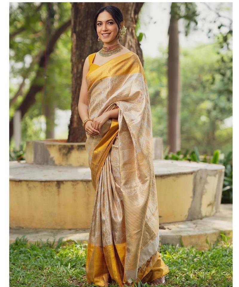 Elegant off white and golden yellow silk blend saree