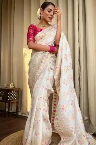 Ivory silk blend saree with pastel floral woven motifs