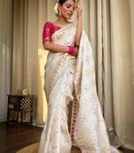 Ivory silk blend saree with pastel floral woven motifs