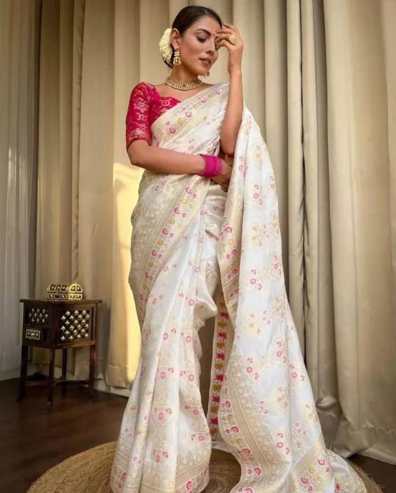 Ivory silk blend saree with pastel floral woven motifs