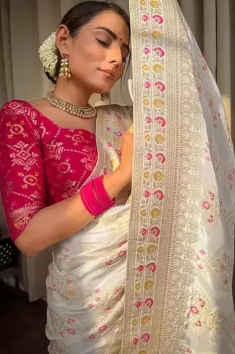 Ivory silk blend saree with pastel floral woven motifs