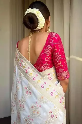 Ivory silk blend saree with pastel floral woven motifs