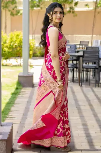 Magenta pink silk blend saree with heavy gold floral weaving