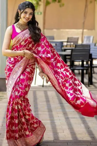 Magenta pink silk blend saree with heavy gold floral weaving
