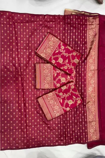 Magenta pink silk blend saree with heavy gold floral weaving
