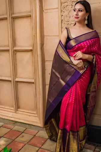 Pink saree with contrasting deep purple silk blend border