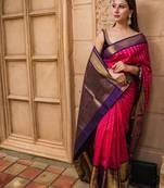 Pink saree with contrasting deep purple silk blend border