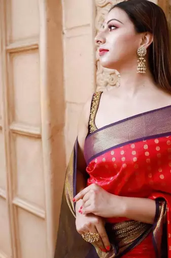 Pink saree with contrasting deep purple silk blend border