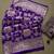 Deep purple silk blend saree with heavy floral zari