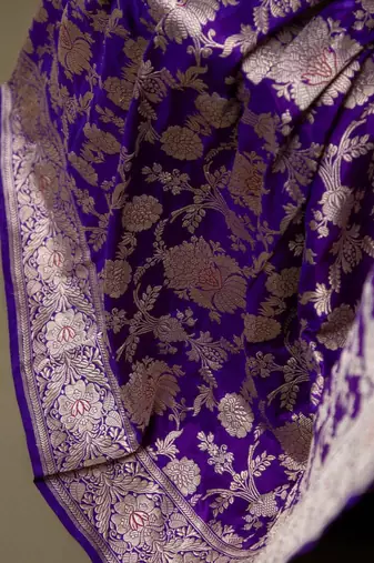 Deep purple silk blend saree with heavy floral zari