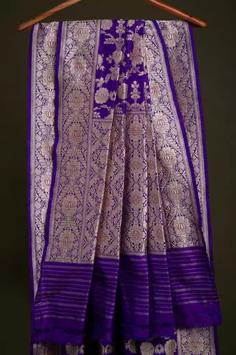 Deep purple silk blend saree with heavy floral zari