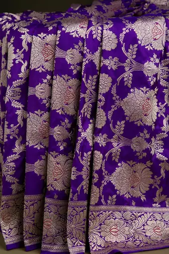 Deep purple silk blend saree with heavy floral zari