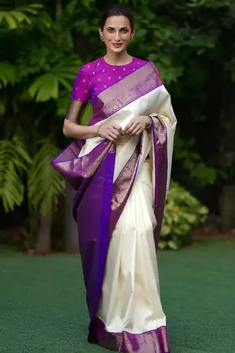 Cream silk blend saree with royal purple zari border