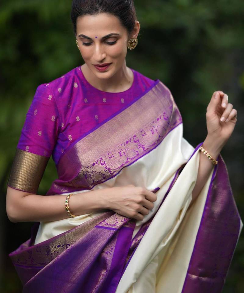 Cream silk blend saree with royal purple zari border
