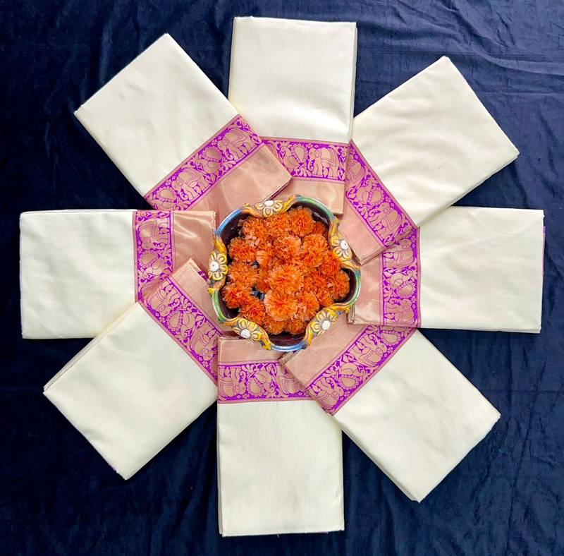 Cream silk blend saree with royal purple zari border