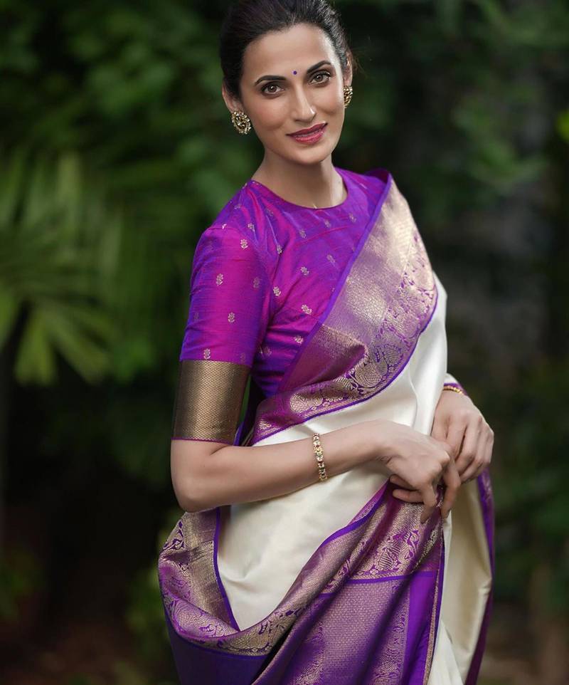 Cream silk blend saree with royal purple zari border