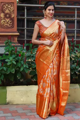 Radiant orange silk blend saree with exquisite gold brocade weave