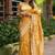 Luminous yellow silk blend saree with multicolored woven butti