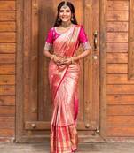 Soft rose pink silk blend saree with vibrant magenta border