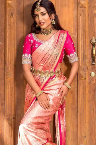 Soft rose pink silk blend saree with vibrant magenta border
