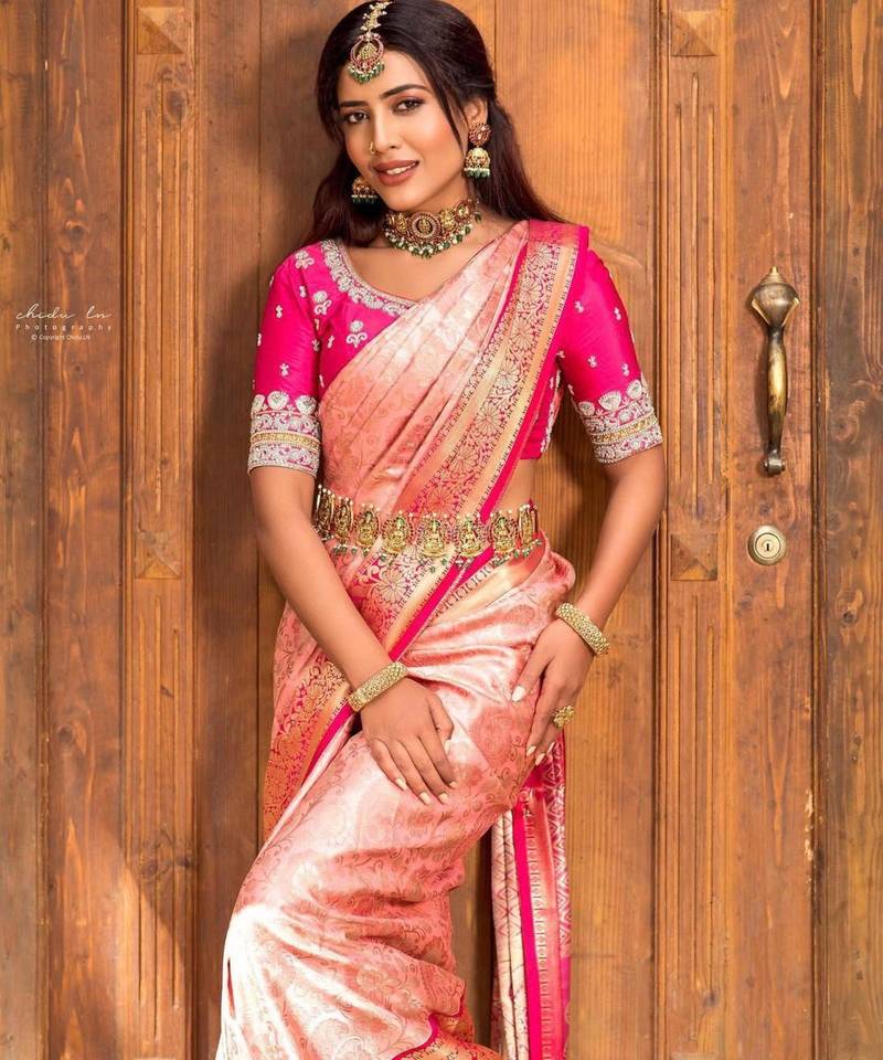 Soft rose pink silk blend saree with vibrant magenta border