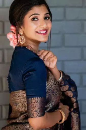 Royal navy blue silk blend saree with intricate bronze weaving