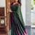 Deep bottle green silk blend saree with magenta border accents