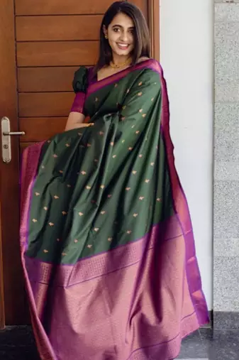 Deep bottle green silk blend saree with magenta border accents