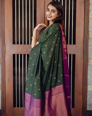 Deep bottle green silk blend saree with magenta border accents 3